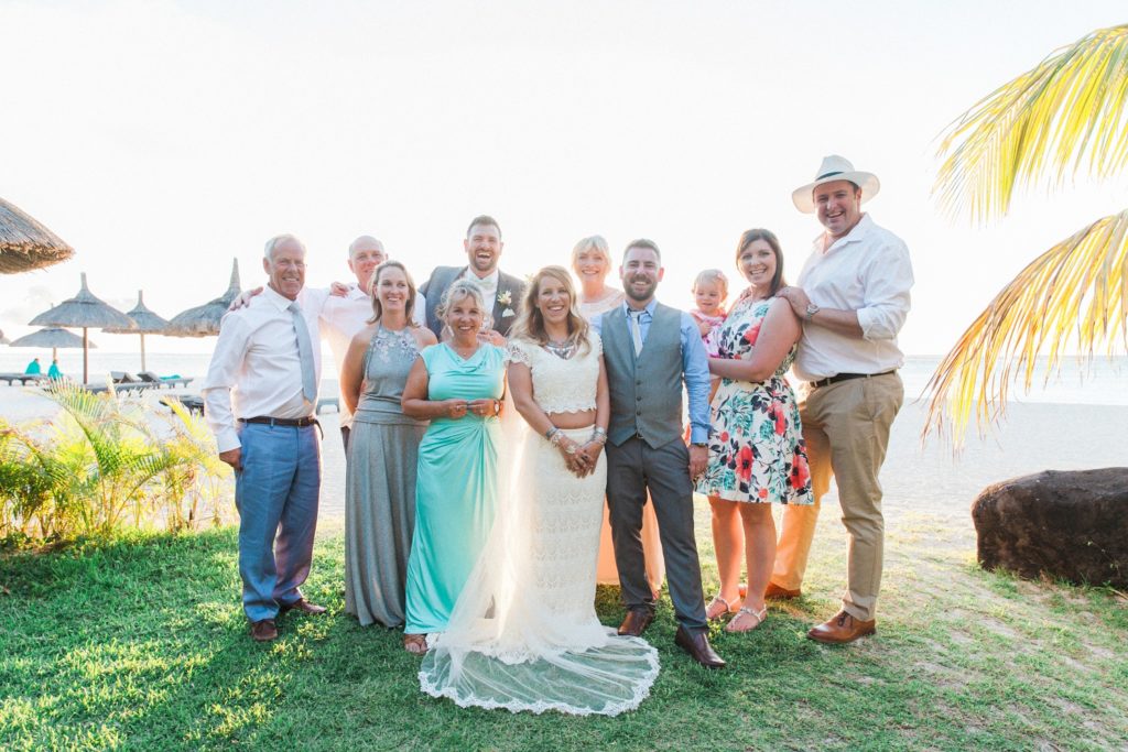 Group photo of the bride, groom and all their guests in Mauritius