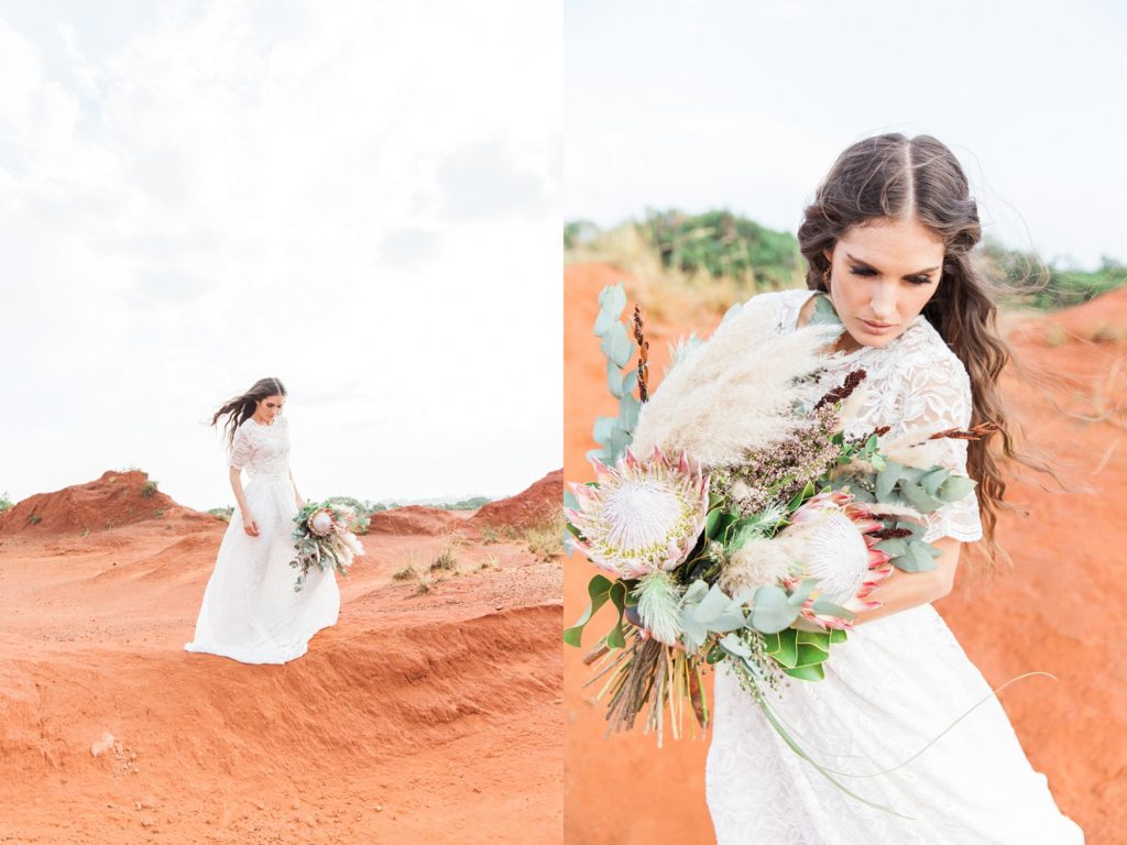 Bride in the Red Desert wearing a Chanelle Wright gown with her protea and pampas bridal bouquet