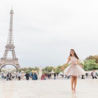 Pretty Pink Paris Wedding Inspiration with Bride Spinning in Front of the Eiffel Tower