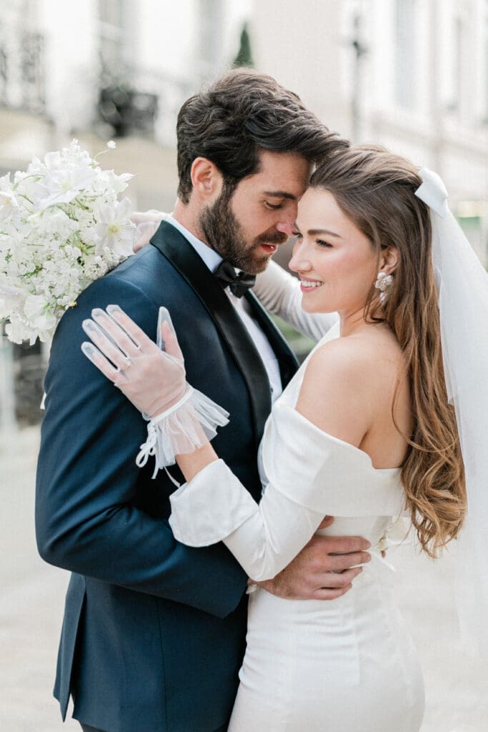 Romantic embrace of bride and groom 