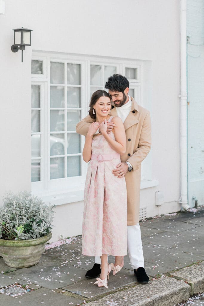 A couple posing romantically in London's Notting Hill for their engagement shoot.