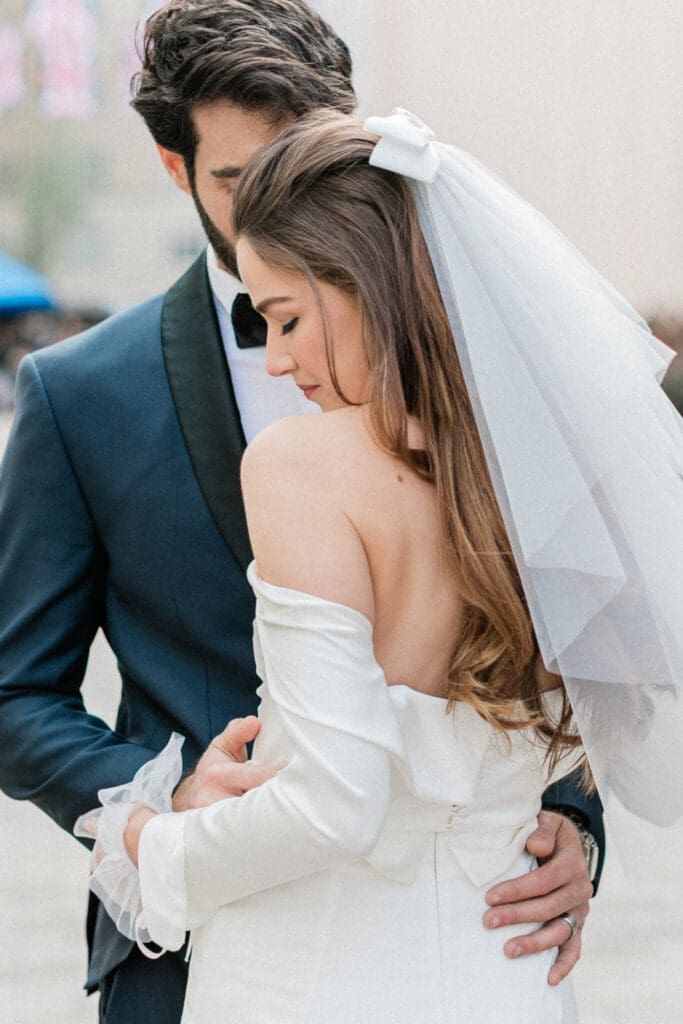 Bride and Groom in a romantic and loving embrace.