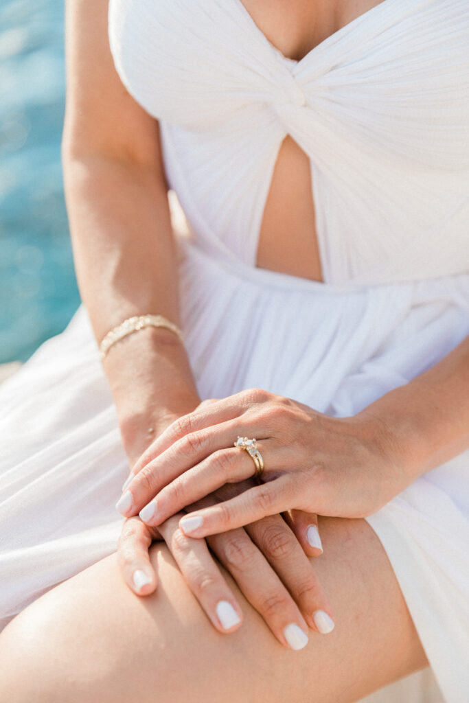 A close up of the bride's hand wearing her wedding ring at her wedding in Ithaca.