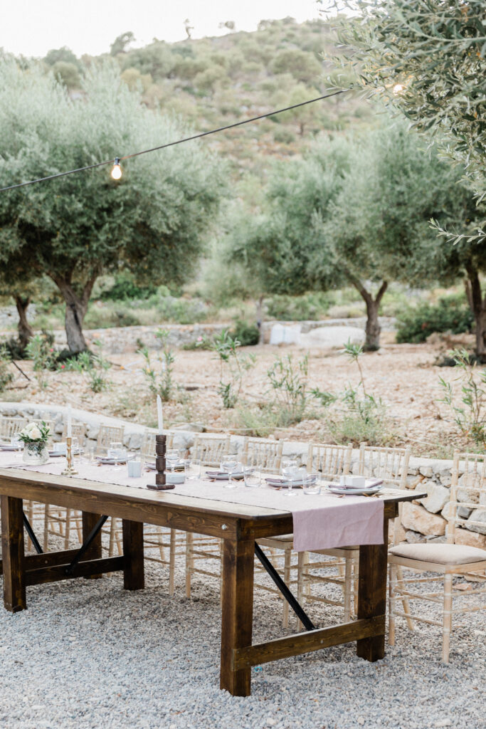 Top table at outdoor wedding reception in Ithaca, Greece.