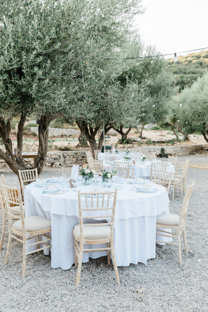 Tables dressed ahead of a wedding reception in Ithaca, Greece.